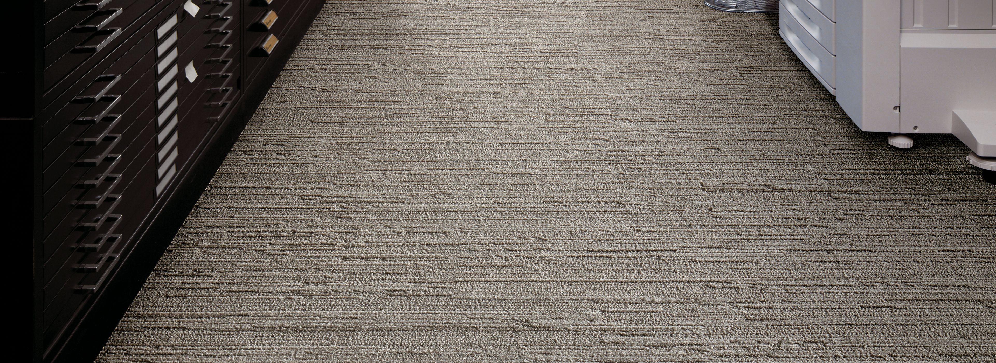 Interface Progression II plank carpet tile in office with women looking at book imagen número 1